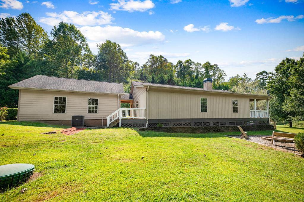 516 Crawford Road Blairsville, GA 30512 - Photo 44 of 49 a view of a house with swimming pool and sitting area