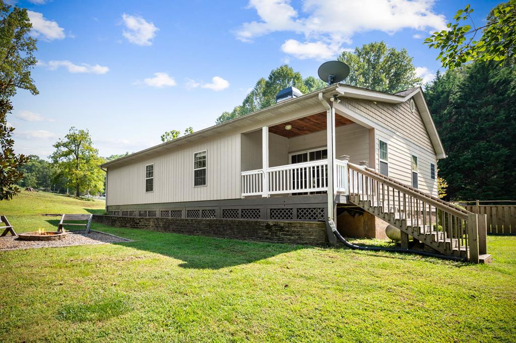 516 Crawford Road Blairsville, GA 30512 - Photo 45 of 49 a front view of a house with garden