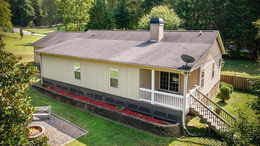 516 Crawford Road Blairsville, GA 30512 - Photo 7 of 49 a aerial view of a house with swimming pool yard and outdoor seating