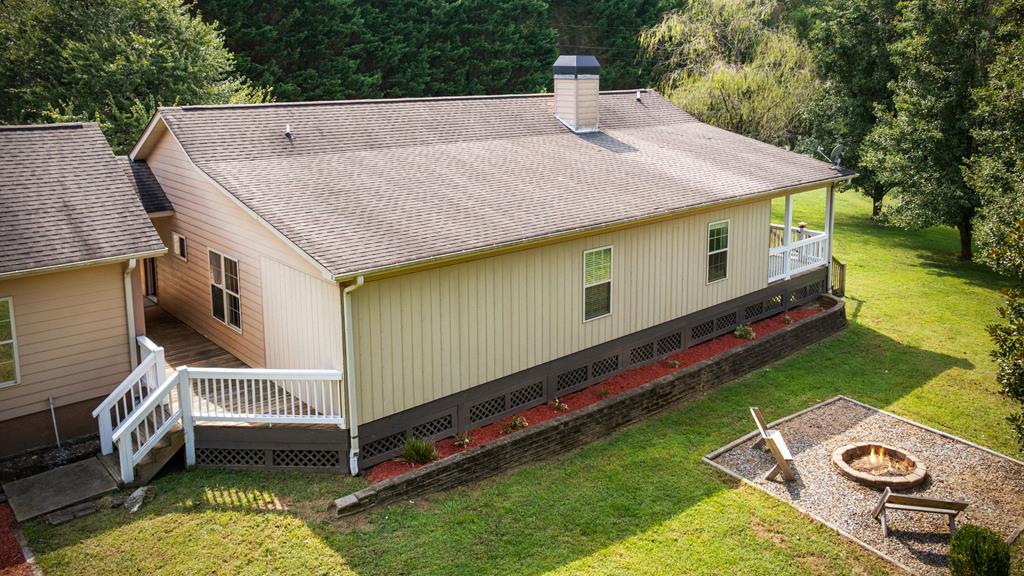 516 Crawford Road Blairsville, GA 30512 - Photo 10 of 49 a aerial view of a house with a yard table and chairs