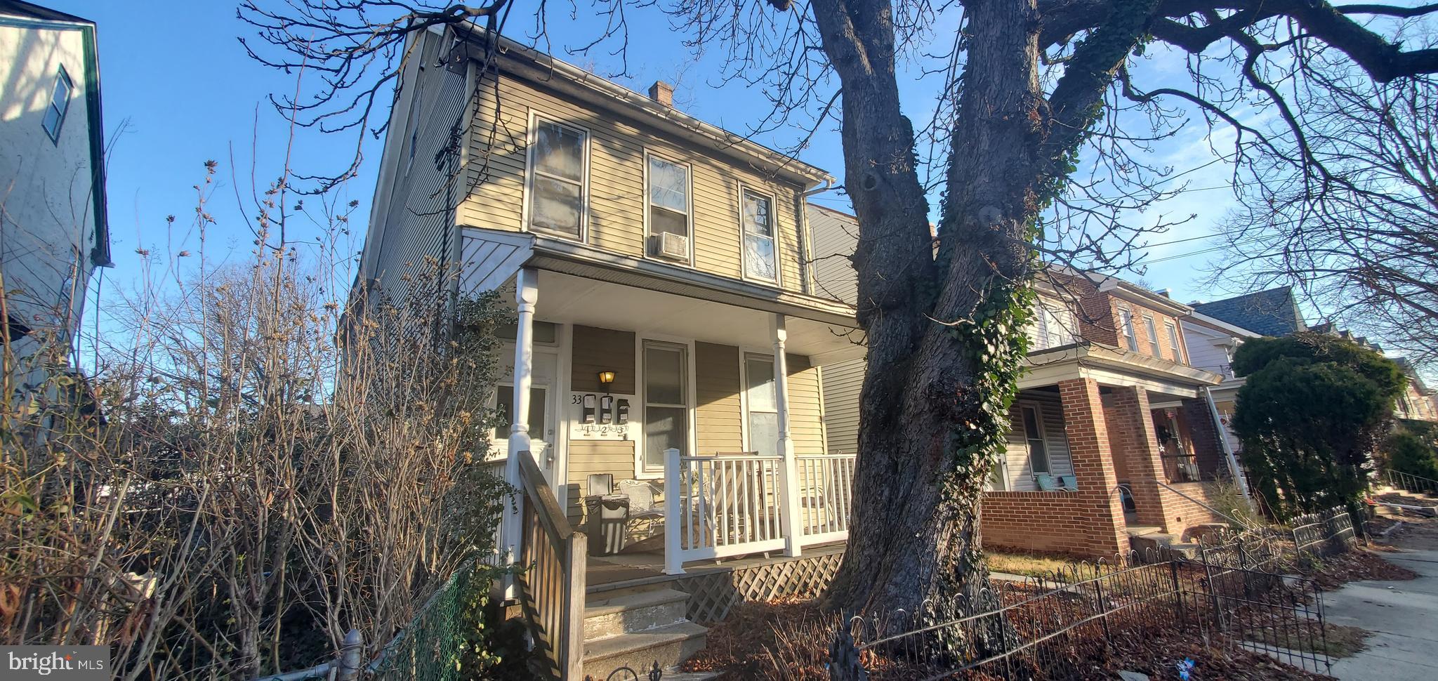 33 Beech Street Pottstown, PA 19464 - Photo 2 of 3 a view of a house with a tree