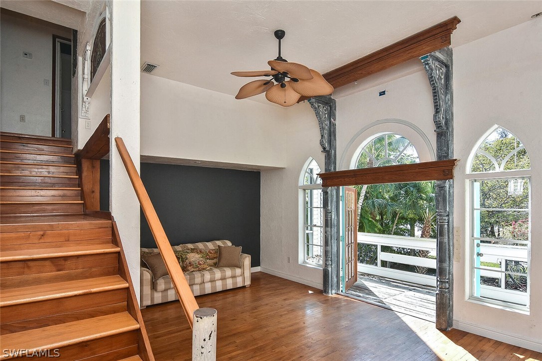 2480 Library Way Sanibel, FL 33957 - Photo 11 of 33 a view of entryway and hall with wooden floor