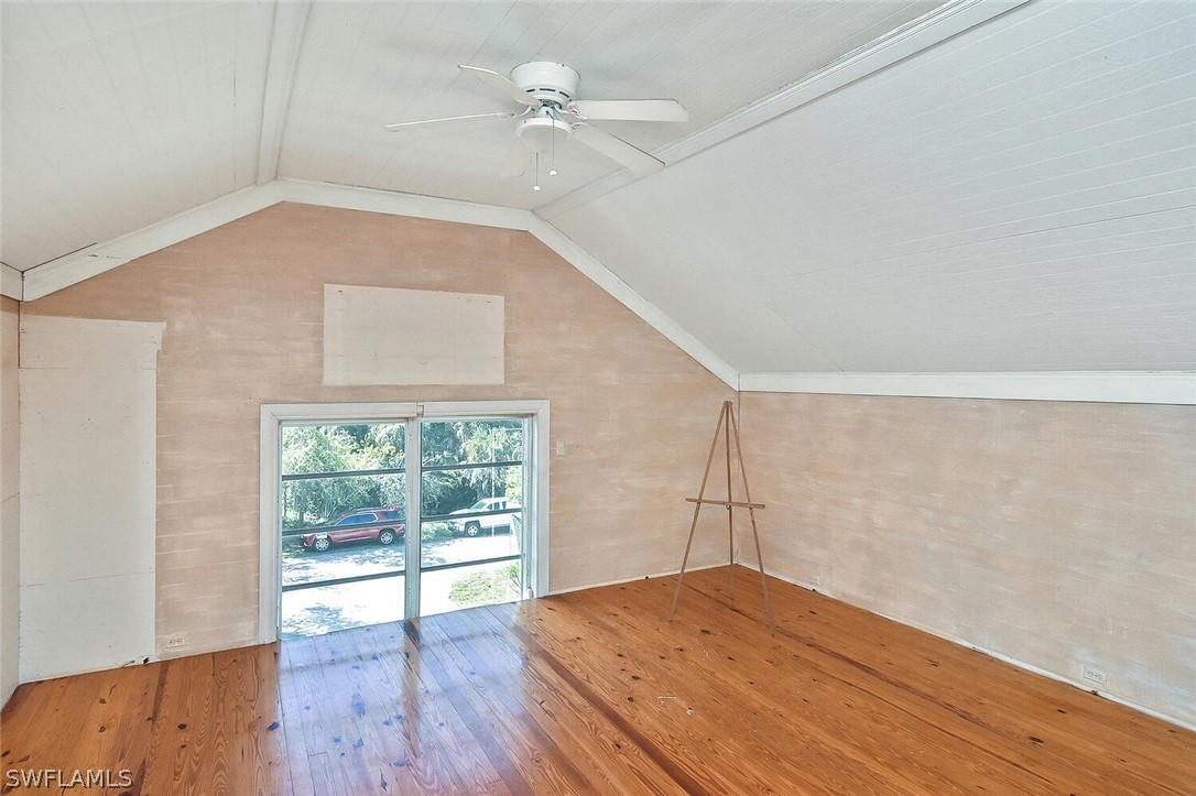 2480 Library Way Sanibel, FL 33957 - Photo 21 of 33 a view of empty room with wooden floor and fan