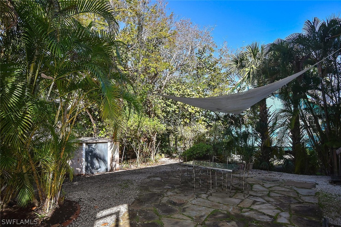2480 Library Way Sanibel, FL 33957 - Photo 30 of 33 a view of an outdoor space and yard