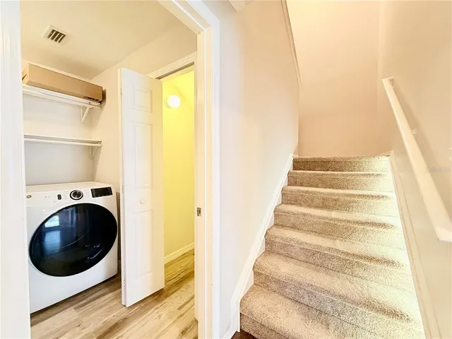 a view of entryway and washer dryer