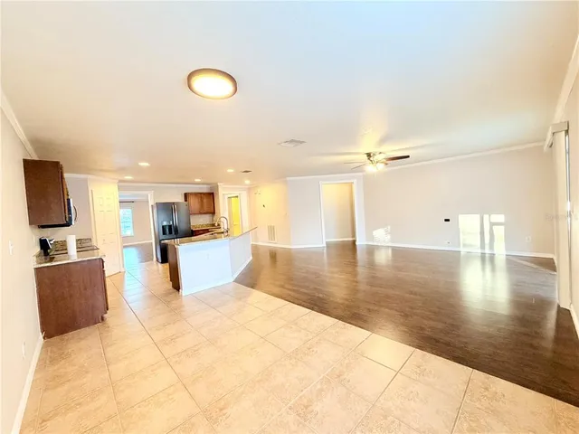 a swimming pool with outdoor seating and yard