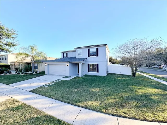 a house view with a garden space