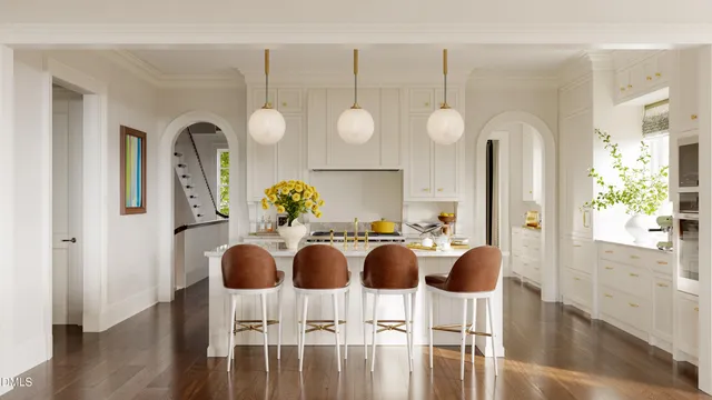 a view of living room with furniture and wooden floor