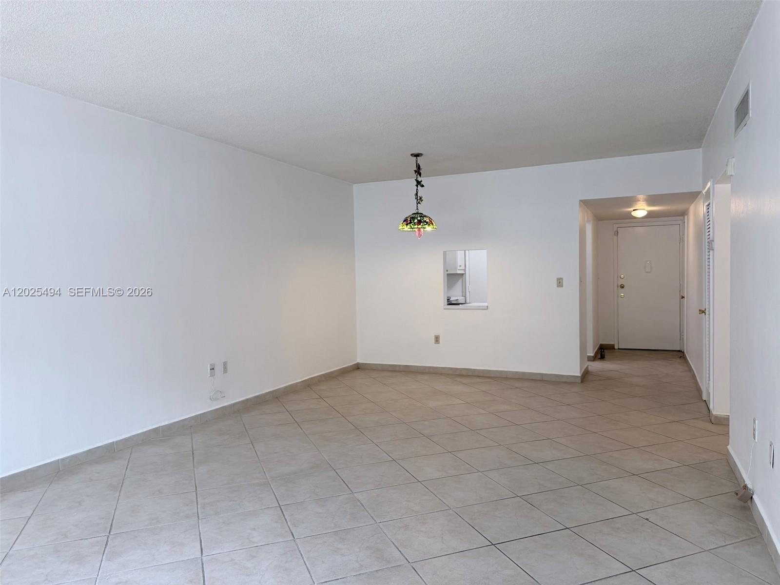 9159 Southwest 77th Avenue, Unit 112 Miami, FL 33156 - Photo 16 of 38 a view of an empty room
