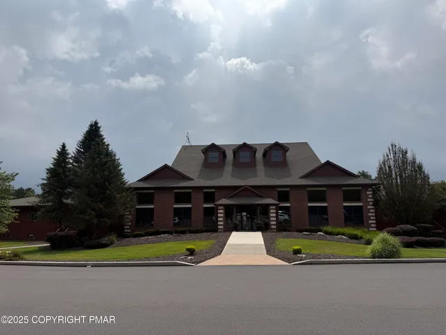 a view of a swimming pool with an ocean view