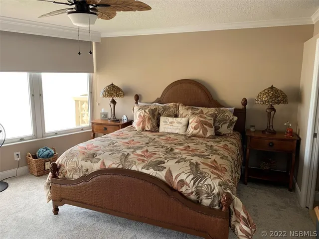 a bathroom with a toilet a sink and shower