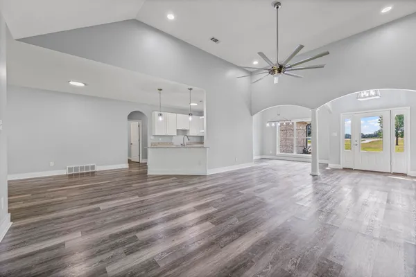 a kitchen with granite countertop white cabinets and a granite counter tops