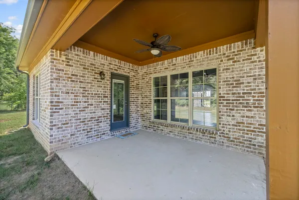 a view of a backyard with a small cabin