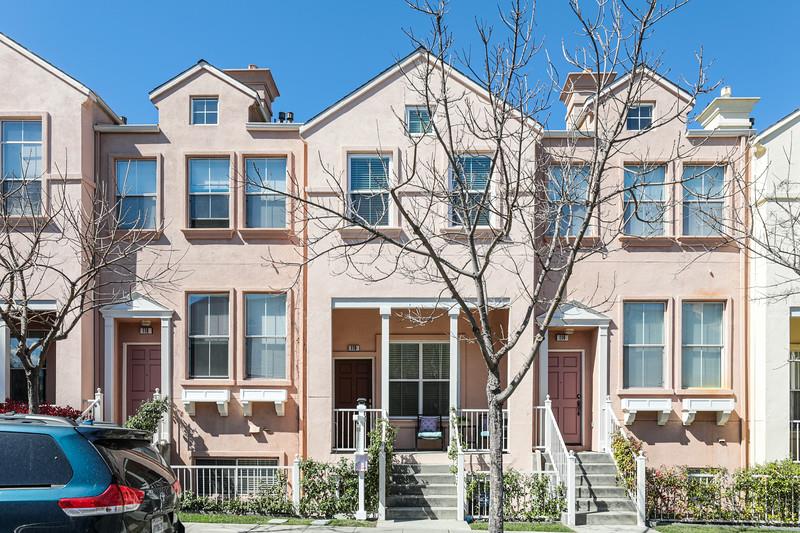 116 Pacchetti Way Mountain View, CA 94040 - Photo 2 of 24 a view of a white house with large windows and a tree
