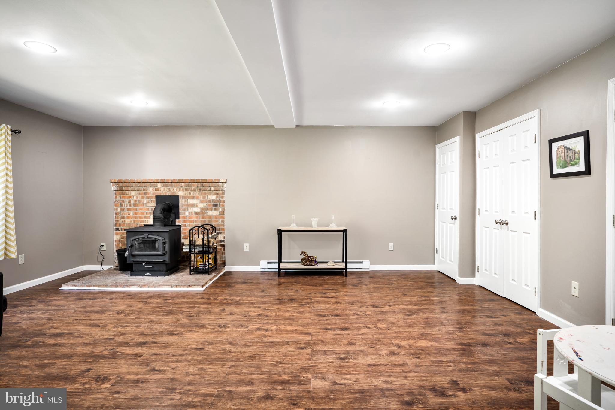 377 Figgins Road Front Royal, VA 22630 - Photo 17 of 29 Family room has a wood stove