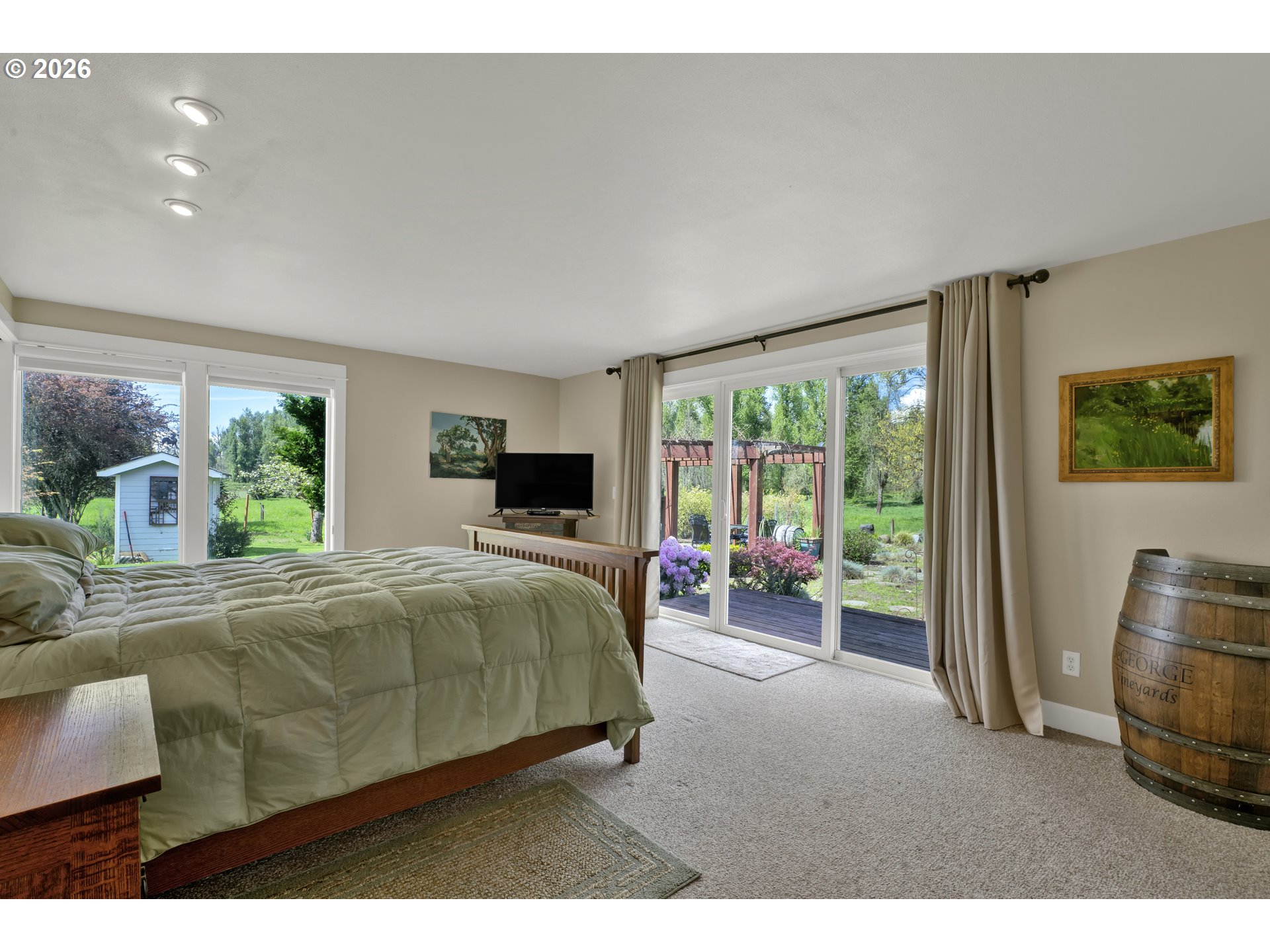 7924 Thurston Road Springfield, OR 97478 - Photo 21 of 45 a bedroom with a bed and a couch