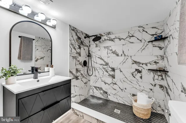 a bathroom with a sink and a mirror