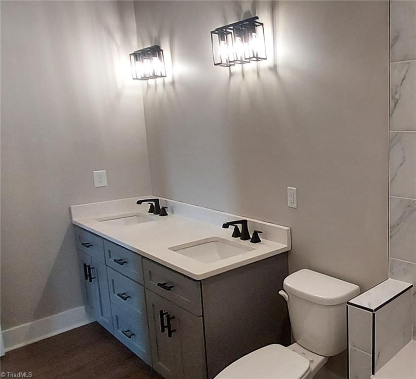 2754 Sandy Cross Road Reidsville, NC 27320 - Photo 13 of 17 Double Sinks in the Primary Bathroom