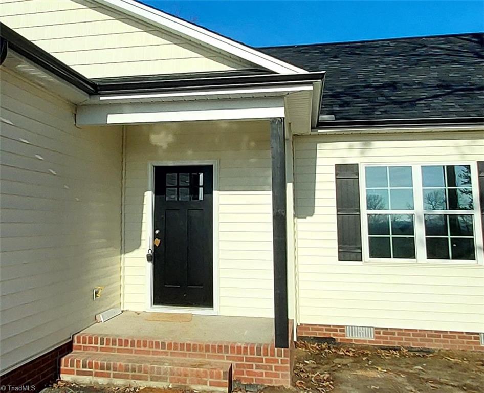 2754 Sandy Cross Road Reidsville, NC 27320 - Photo 3 of 17 Craftsman Style Front Door with a Cover Front Porch
