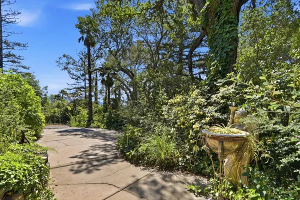a view of a dining room with furniture and window