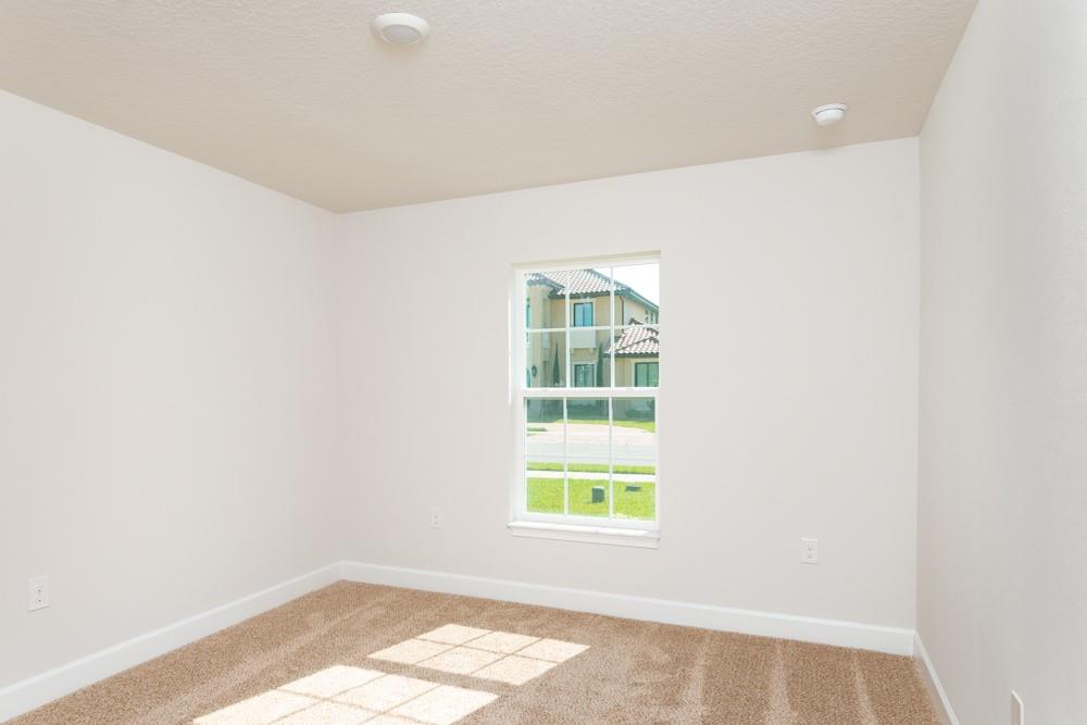 551 Quarry Lane Sebastian, FL 32958 - Photo 12 of 23 an empty room with a window