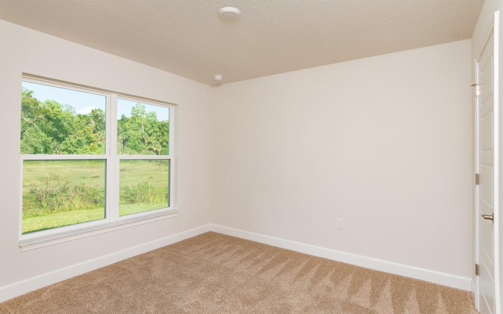 551 Quarry Lane Sebastian, FL 32958 - Photo 13 of 23 an empty room with a window