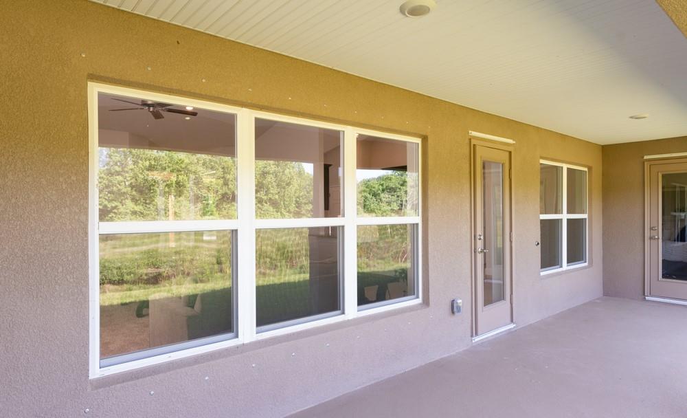 551 Quarry Lane Sebastian, FL 32958 - Photo 21 of 23 a view of an empty room with glass door and balcony