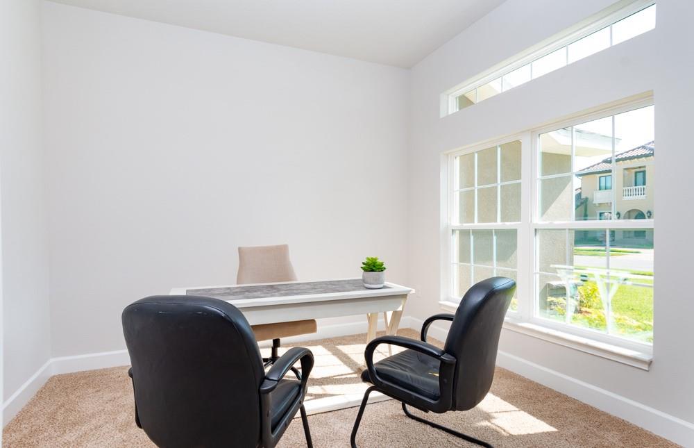 551 Quarry Lane Sebastian, FL 32958 - Photo 4 of 23 a view of a dining room with furniture and a window