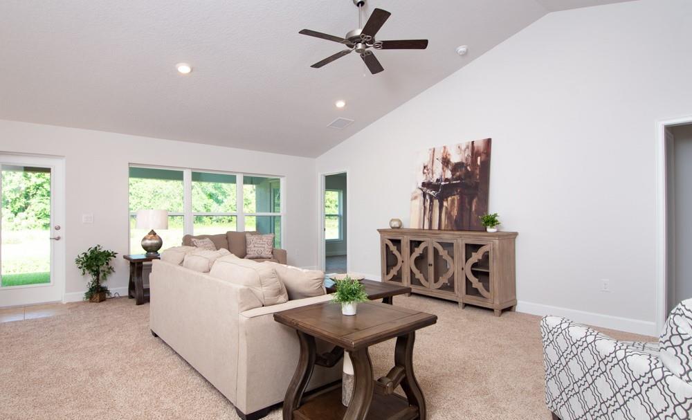 551 Quarry Lane Sebastian, FL 32958 - Photo 5 of 23 a living room with furniture and a table
