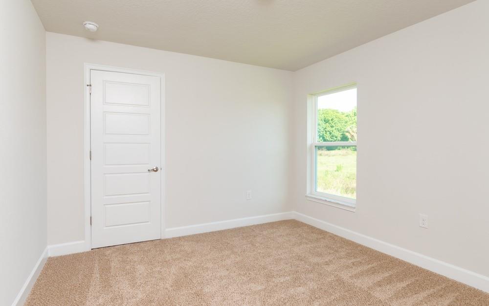 551 Quarry Lane Sebastian, FL 32958 - Photo 10 of 23 an empty room with a window