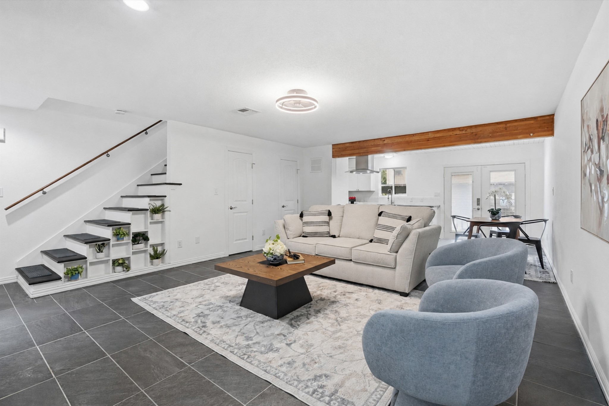 1011 Hamblen Road, Unit 306 Houston, TX 77339 - Photo 7 of 38 This angle shows just how connected the living area feels to the kitchen and dining space beyond, so conversation flows just as easily as the layout does.