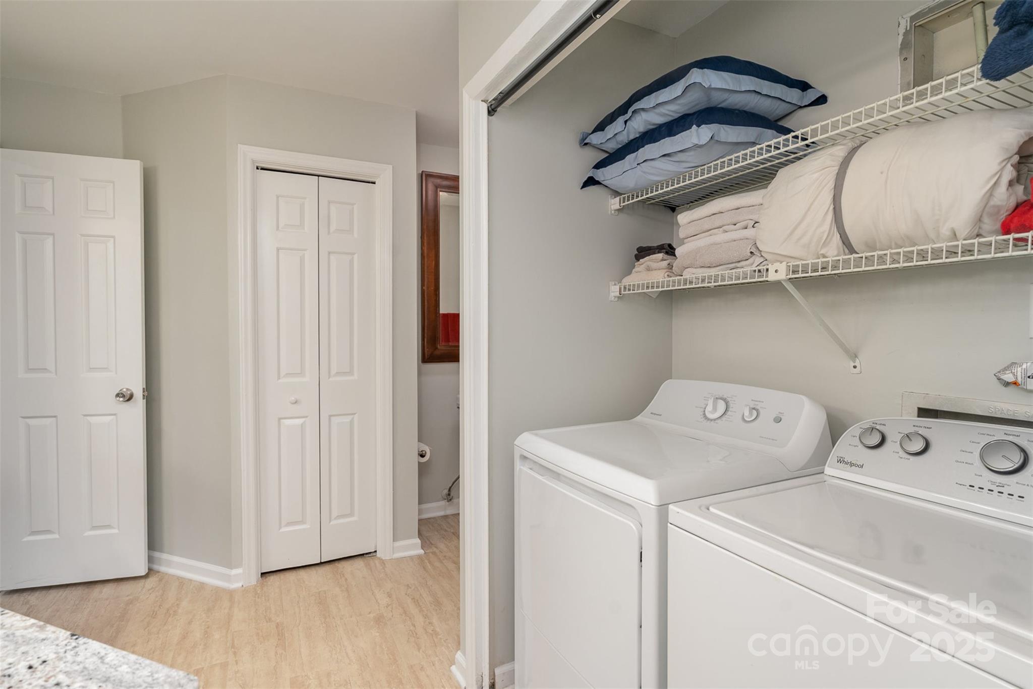 6501 Clavell Lane, Unit B Charlotte, NC 28210 - Photo 11 of 13 a utility room with dryer and washer