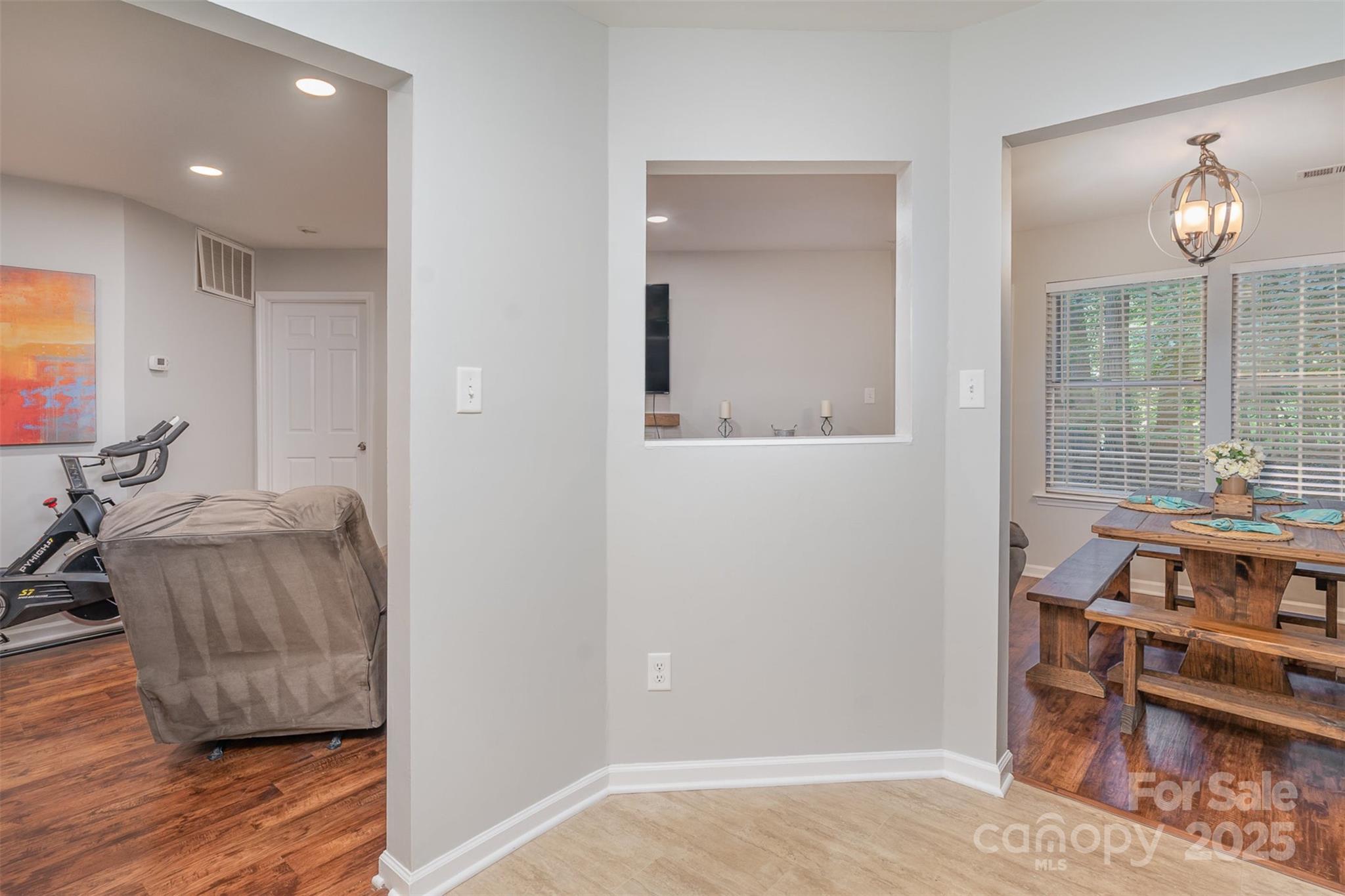 6501 Clavell Lane, Unit B Charlotte, NC 28210 - Photo 7 of 13 a living room with furniture and a table