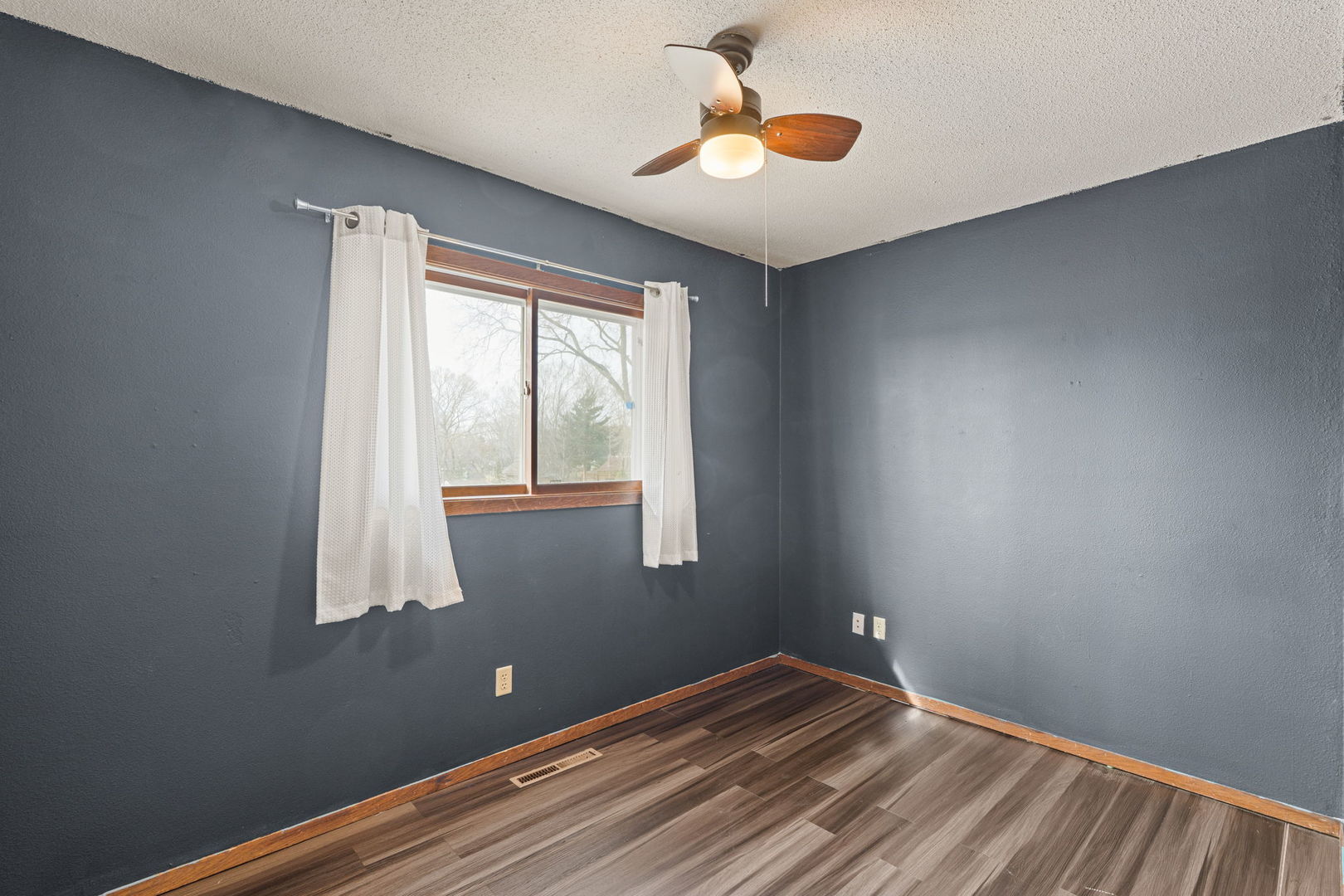214 South 3rd Street Le Claire, IA 52753 - Photo 18 of 40 a view of a room with a window