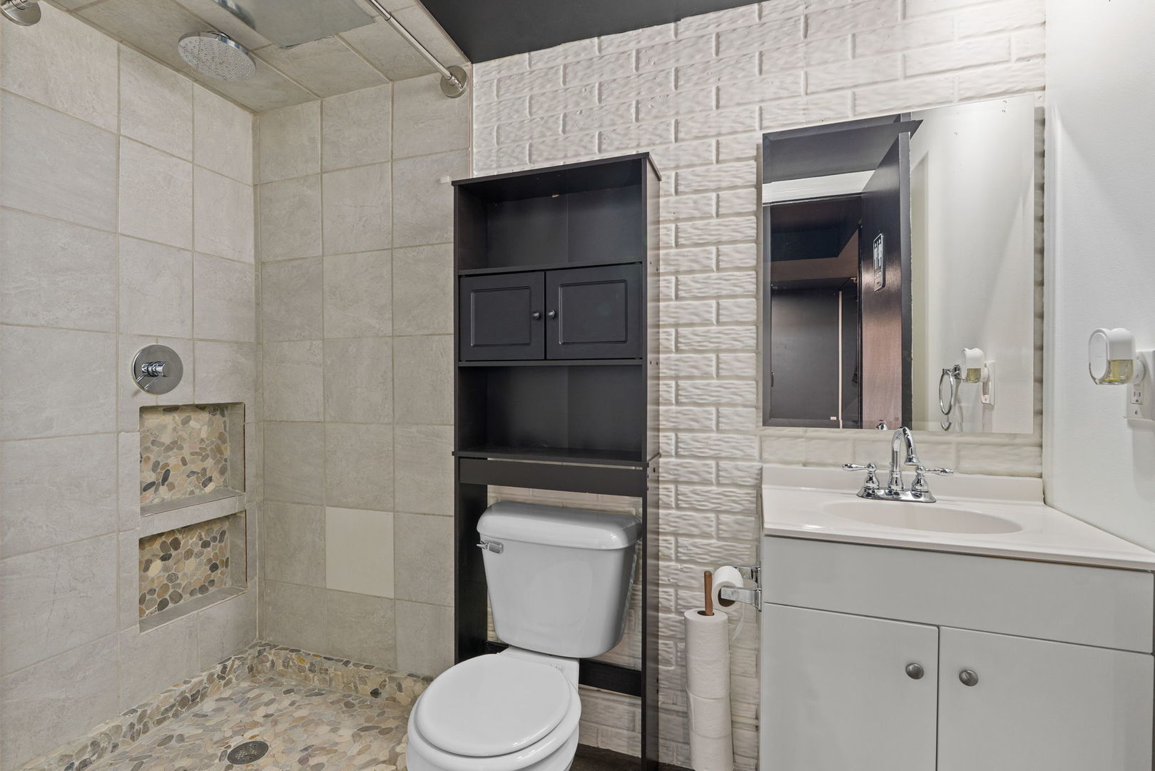 214 South 3rd Street Le Claire, IA 52753 - Photo 25 of 40 a bathroom with a toilet sink and shower