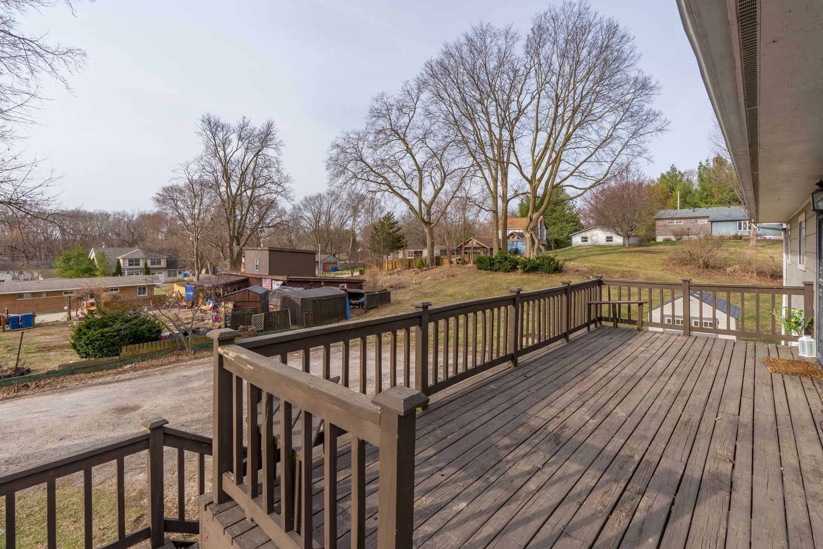 214 South 3rd Street Le Claire, IA 52753 - Photo 3 of 40 a view of deck with seating space and trees
