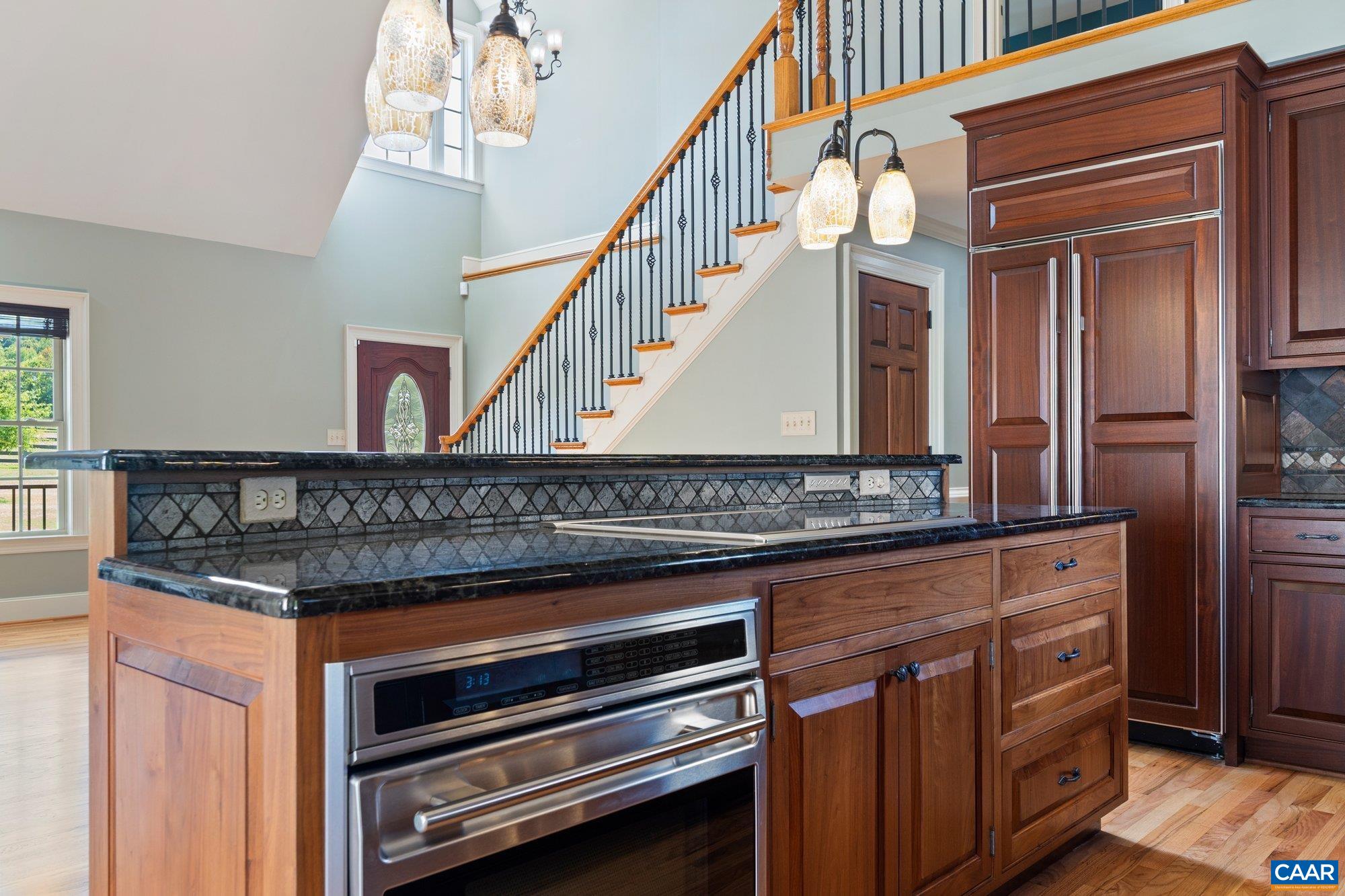 884 Pleasant Gap Drive Dry Fork, VA 24549 - Photo 25 of 72 Blue Volga granite counter tops. Sub-Zero refrigerator, Wolf range/stove. Miele dishwasher.
