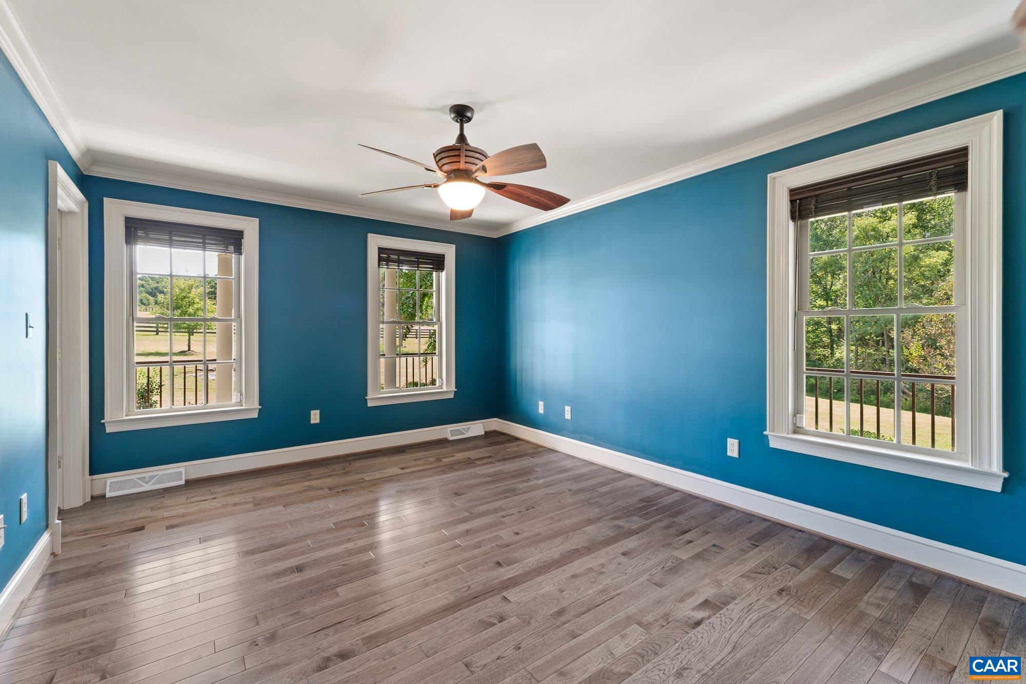884 Pleasant Gap Drive Dry Fork, VA 24549 - Photo 34 of 72 a view of an empty room with window and wooden floor