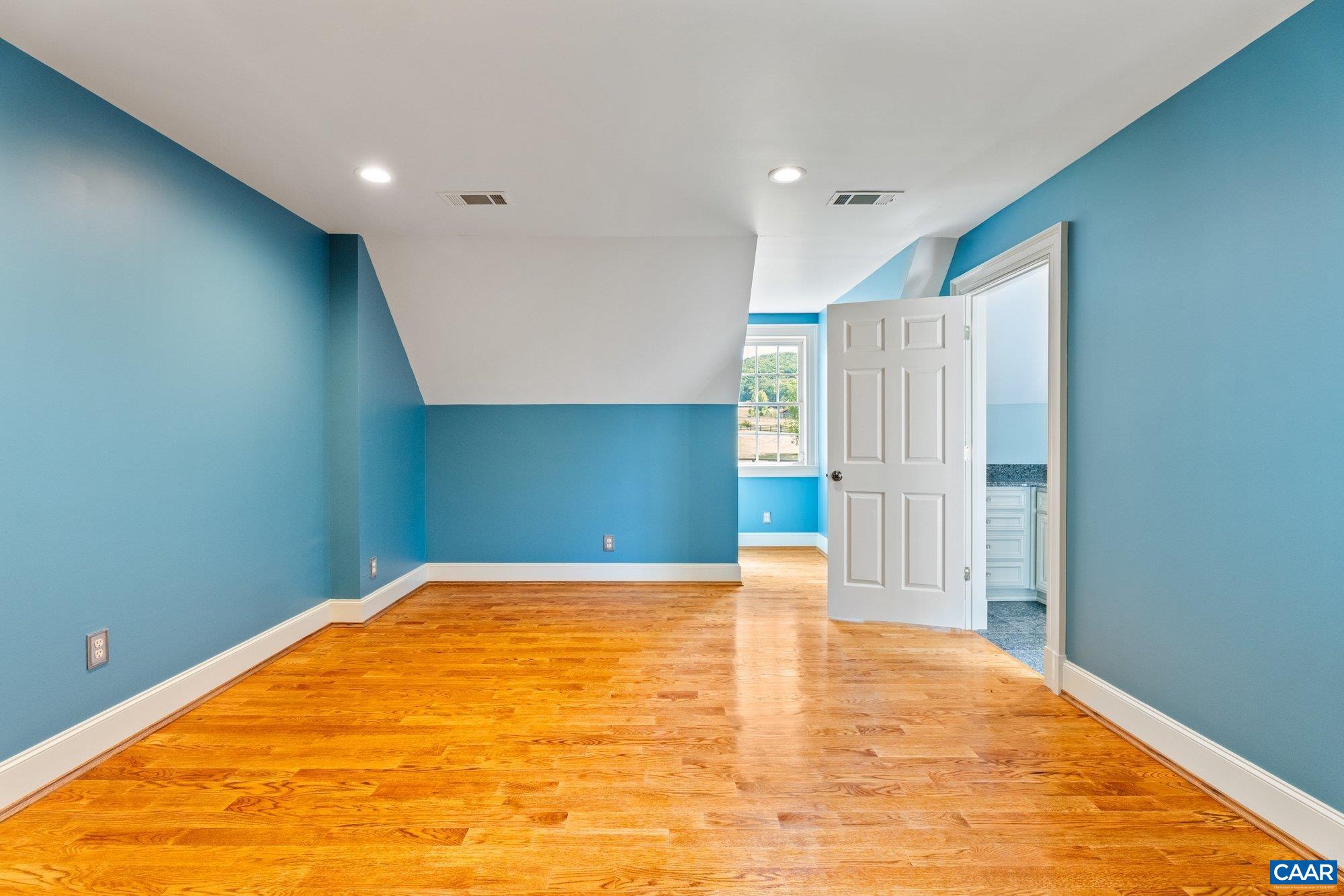 884 Pleasant Gap Drive Dry Fork, VA 24549 - Photo 39 of 72 a view of a big room with wooden floor
