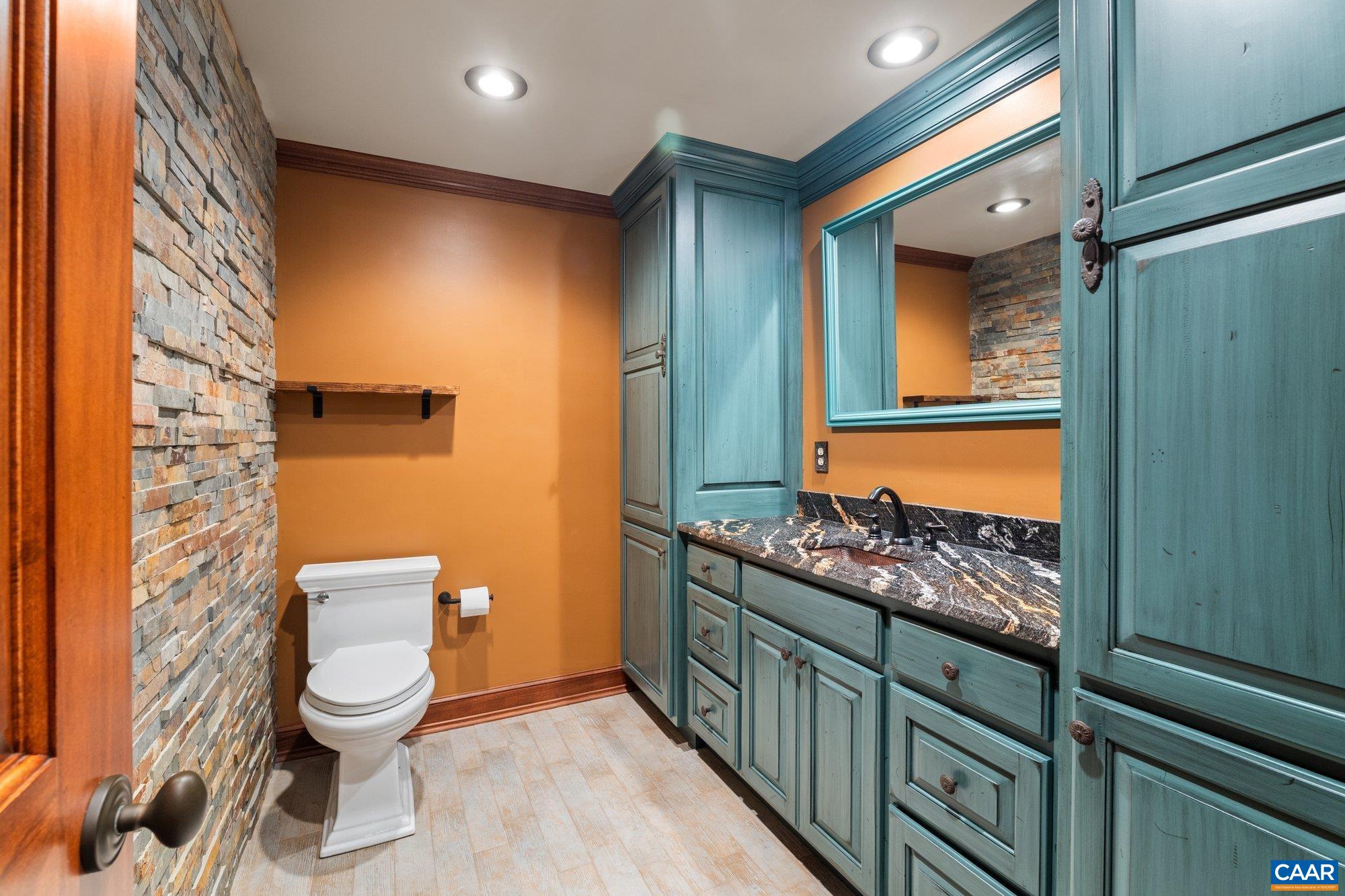 884 Pleasant Gap Drive Dry Fork, VA 24549 - Photo 47 of 72 Copper sink, granite counter, slate wall. Custom maple cabinets