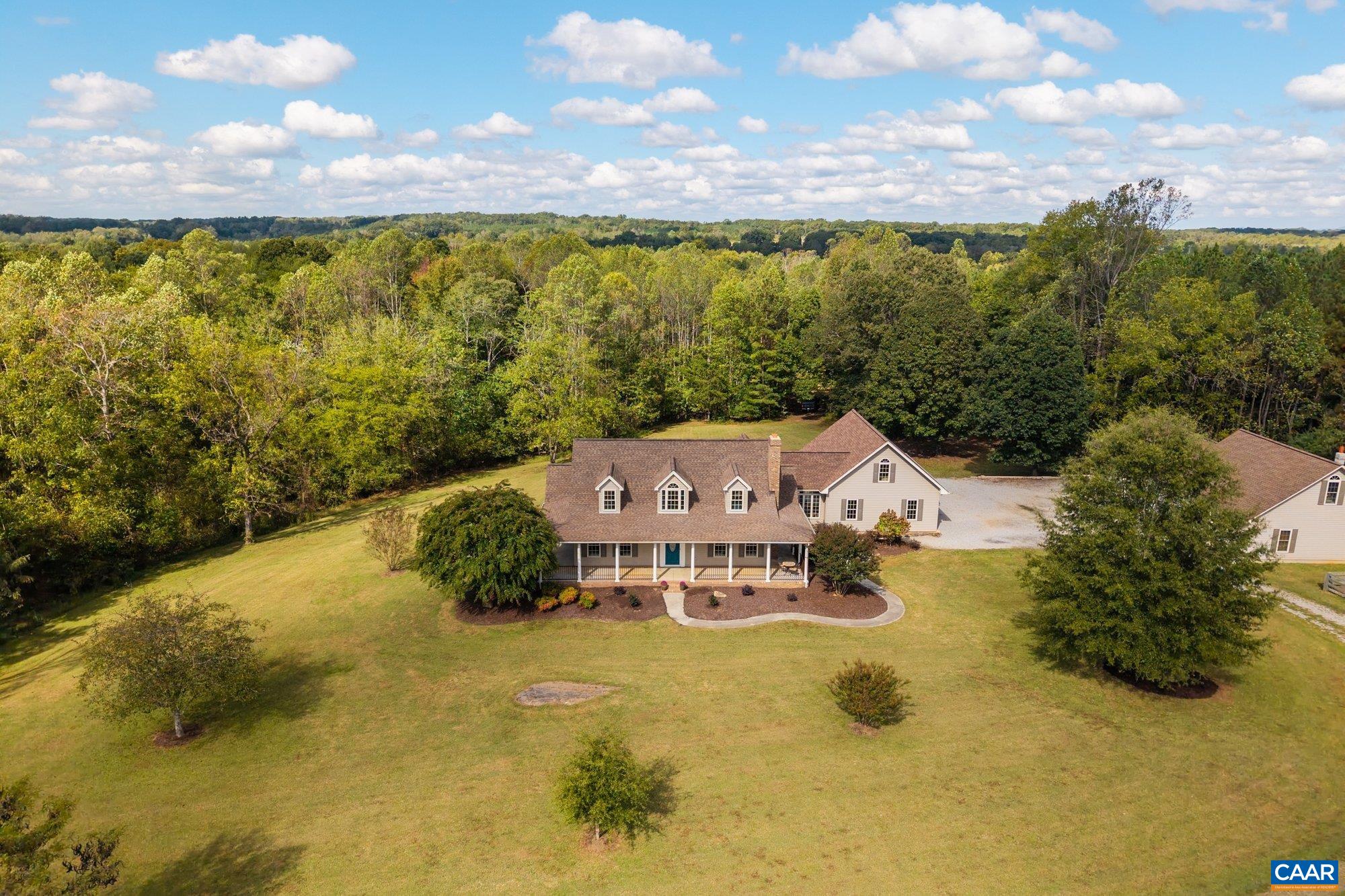 884 Pleasant Gap Drive Dry Fork, VA 24549 - Photo 10 of 72 a view of a lake with a mountain in the background