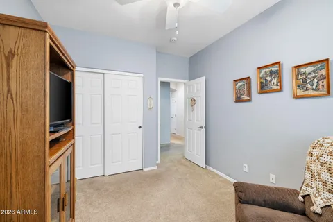 a view of livingroom with furniture and cabinet