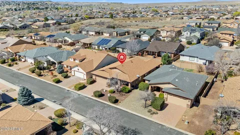 an aerial view of a house with outdoor space