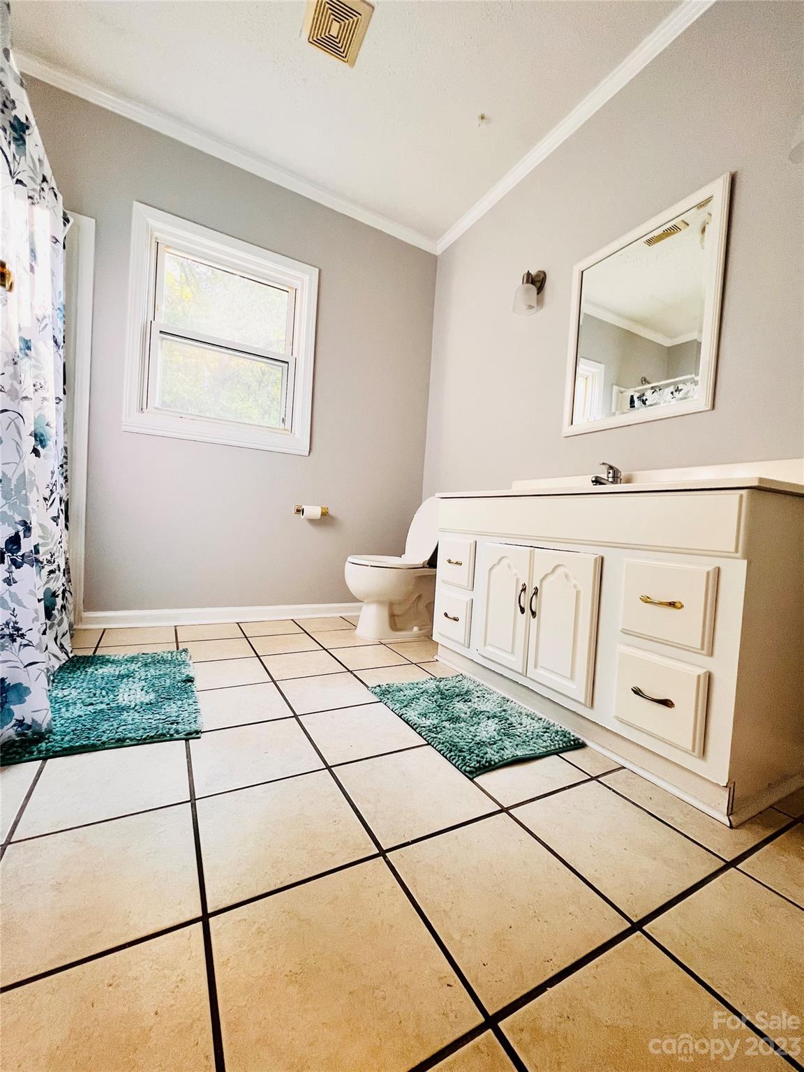 207 7th Avenue Southwest Conover, NC 28613 - Photo 5 of 12 a living room with a black white checkered floor
