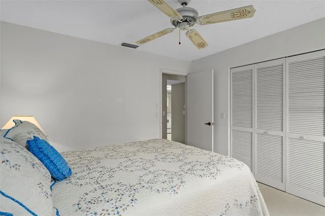 a bathroom with a toilet sink and shower