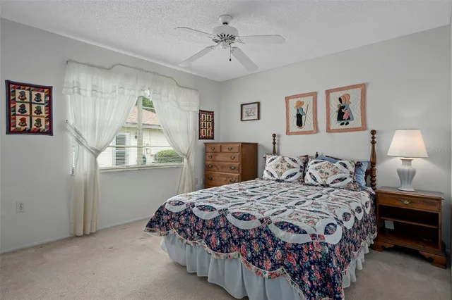 a backyard of a house with trampoline