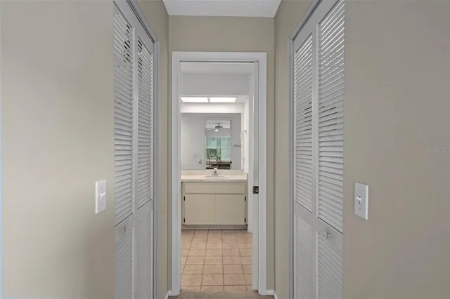 a front view of a house with a garden and porch