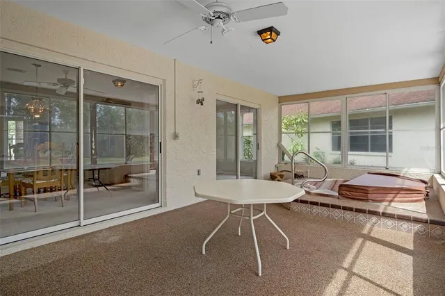 a view of a lake with houses in the background