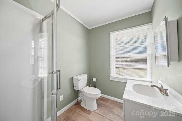 a bathroom with a sink toilet and tub