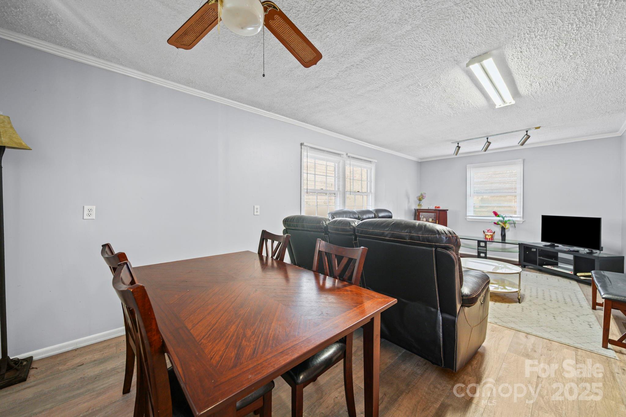 1703 East Perry Street Gastonia, NC 28054 - Photo 18 of 30 a view of a dining room with furniture